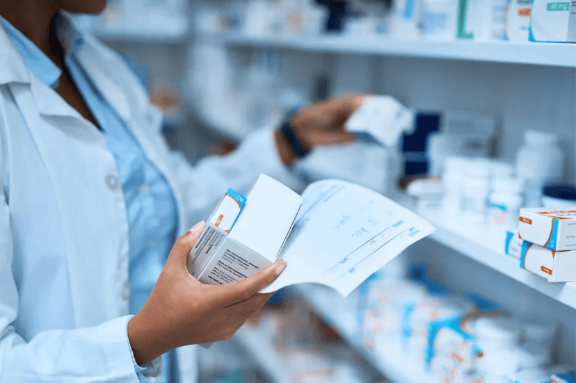 Pharmacist checking prescription